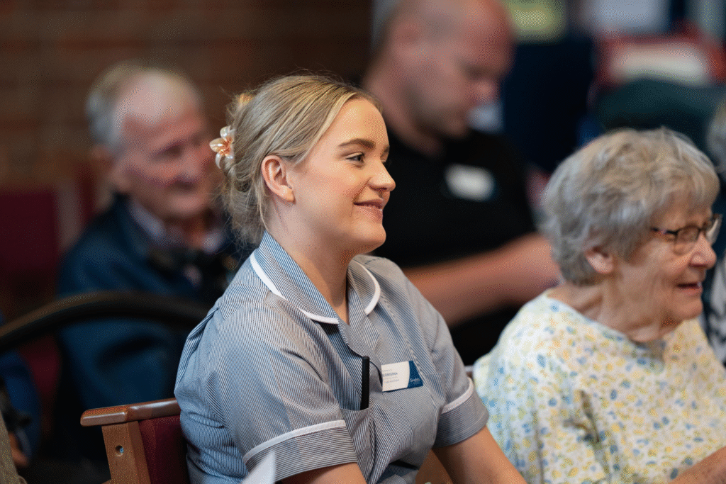Nurse and others enjoying a concert