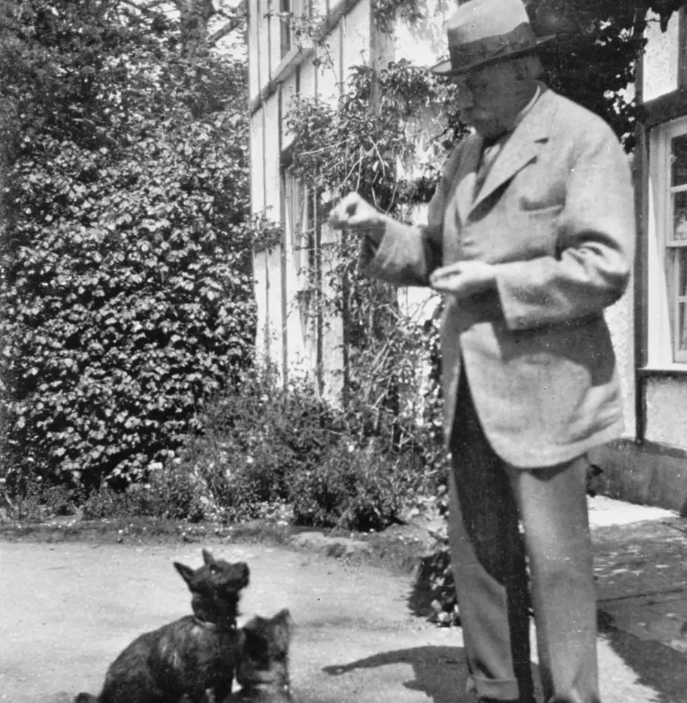 Black and white photo of Elgar with dogs Napleton Grange