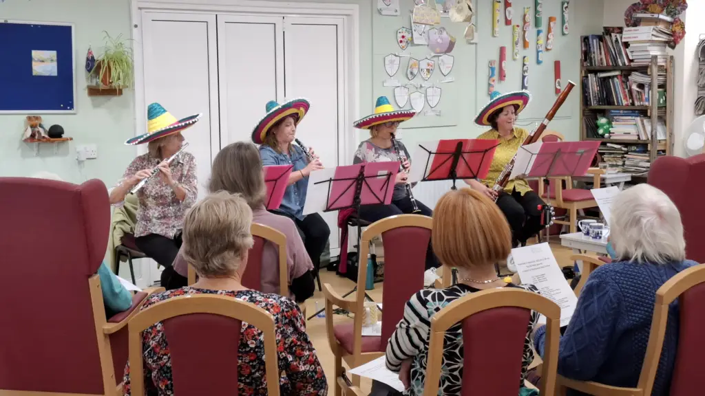 Musicians playing wind instruments during the Relaxed ESO Winds performance